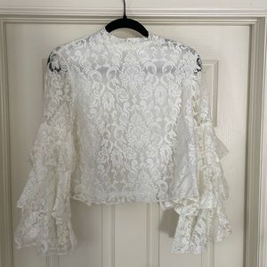 White shirt buttons up the back